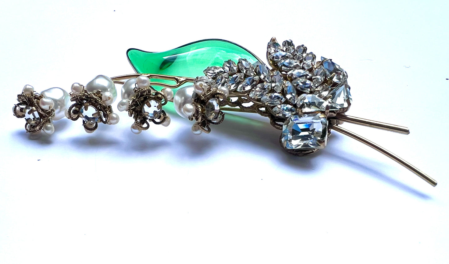 Exquisite single poured glass emerald leaf lily of the valley brooch