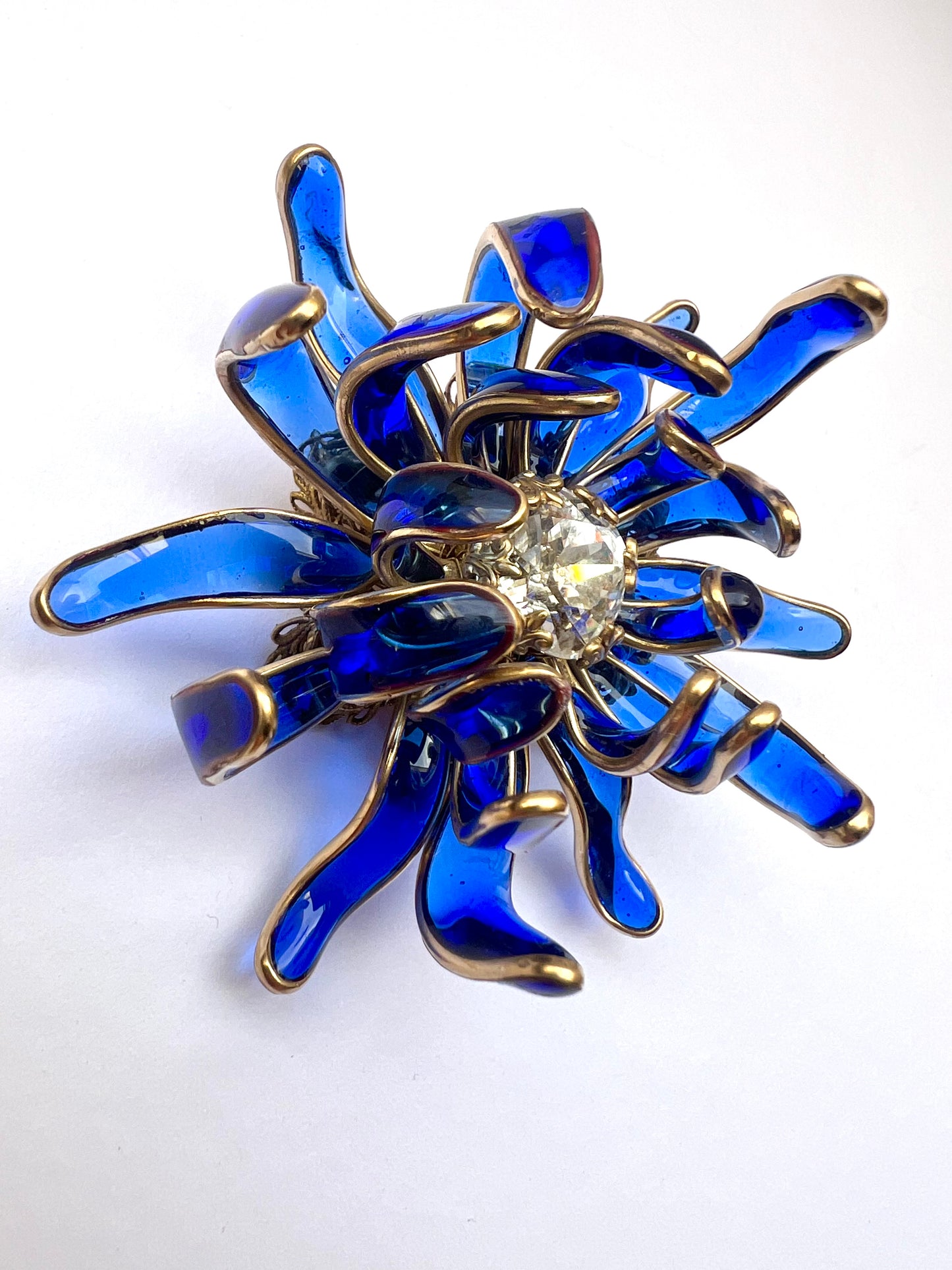 Chrysanthemum poured glass brooch in Bristol blue