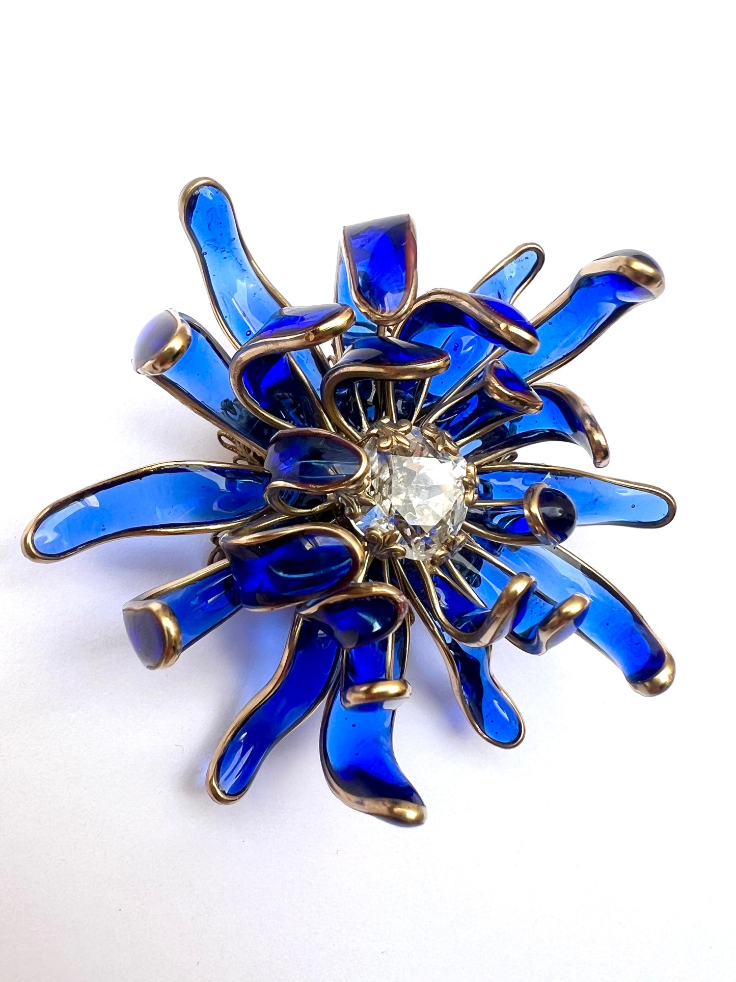 Chrysanthemum poured glass brooch in Bristol blue