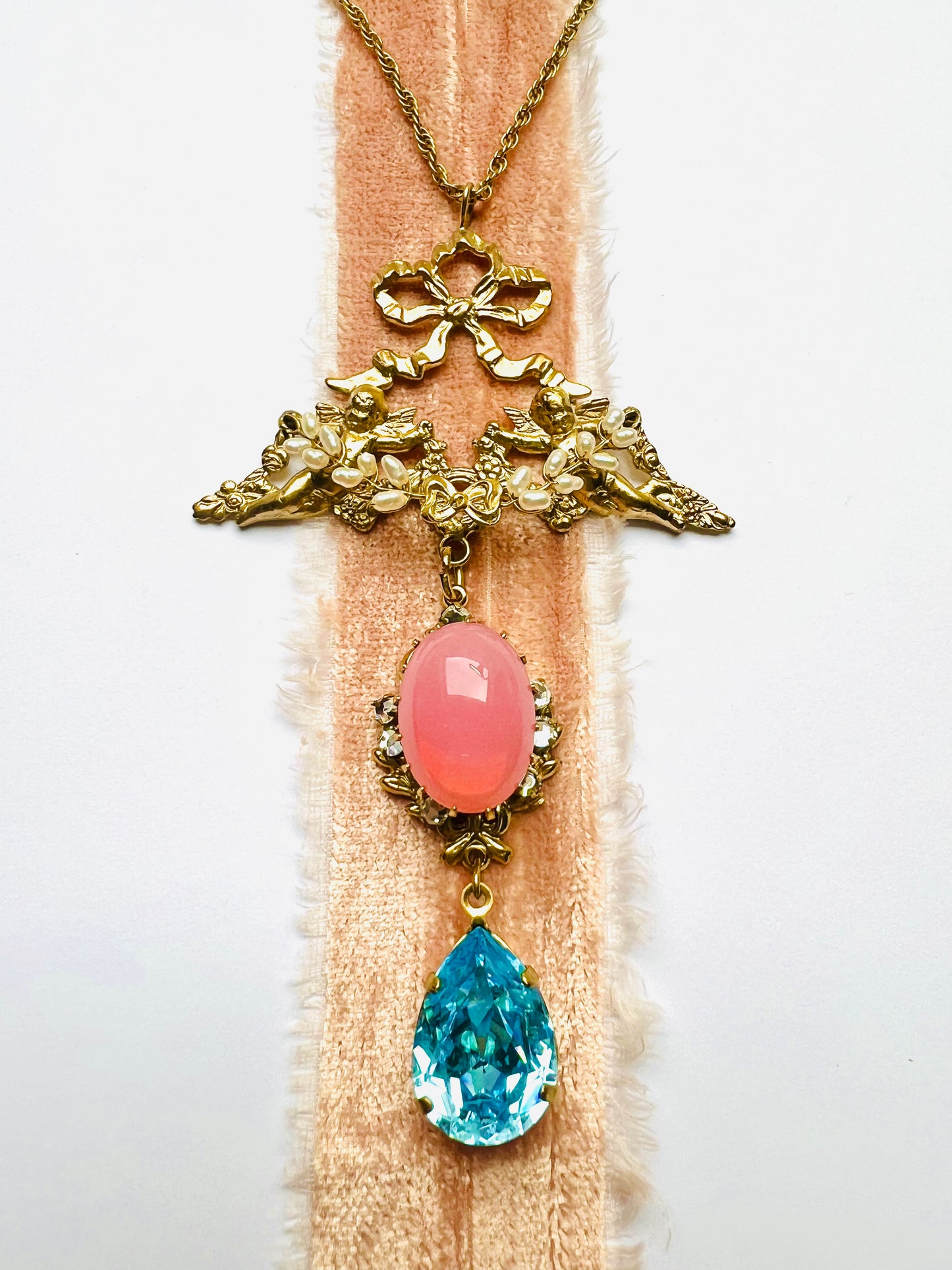 Cherub real seed pearl pendant necklace
