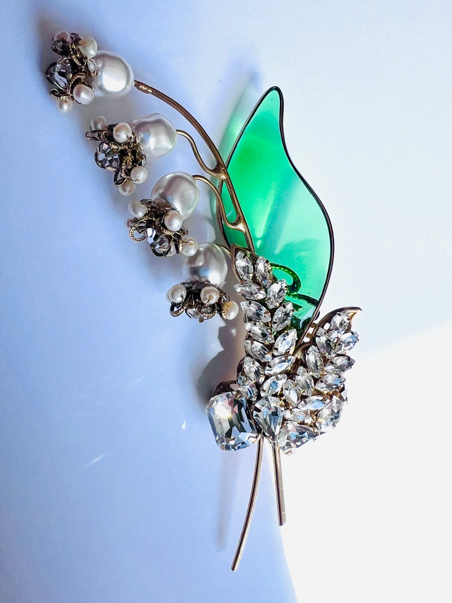 Exquisite single poured glass emerald leaf lily of the valley brooch