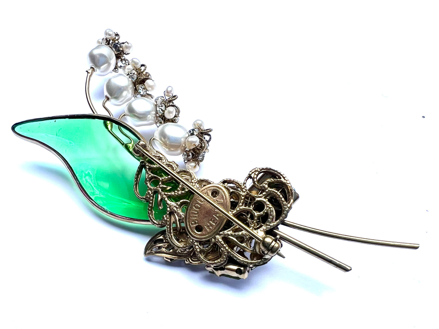 Exquisite single poured glass emerald leaf lily of the valley brooch