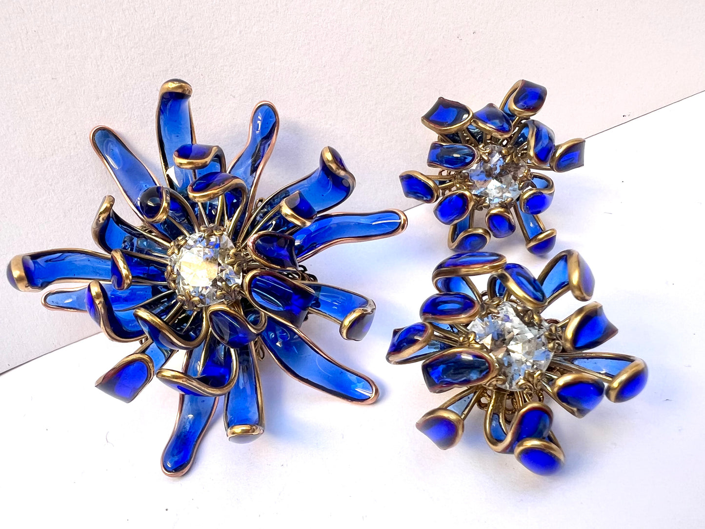 Chrysanthemum poured glass brooch in Bristol blue